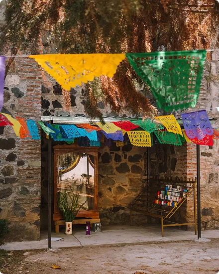 Stone palenque entrance strung with flags